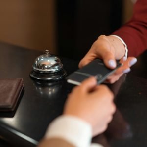 person checking in to a boutique hotel for the weekend